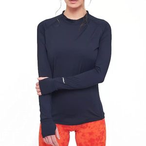Remera Training Kion Heat Warm Ng Mujer