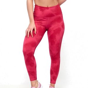 Calza Training Kion Mug Coral Rs Mujer